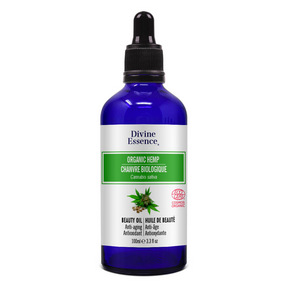 Divine Essence hemp oil in blue bottle with dropper lid